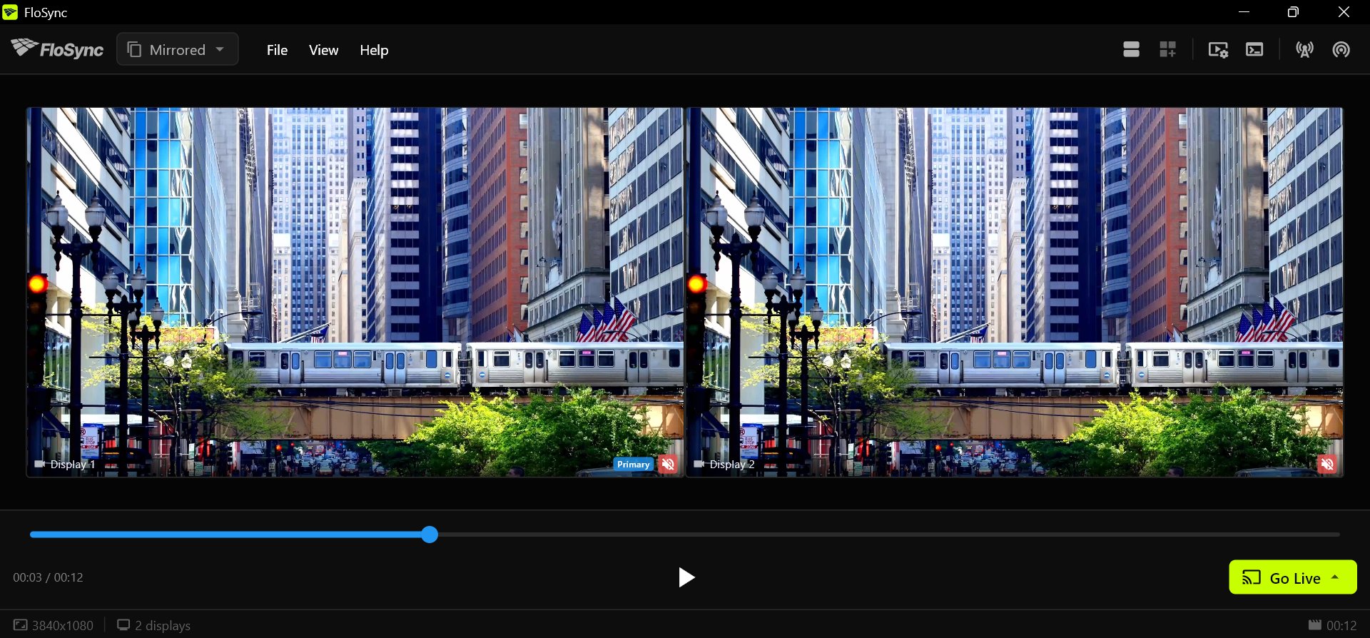 The control panel with the mode dropdown set to Mirrored and two screen boxes showing the same frame of a video.
