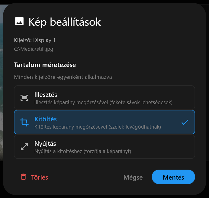 A Kép beállítások párbeszédablak egy képhez, a Tartalom méretezése Illesztés, Kitöltés és Nyújtás lehetőségeivel, Kitöltés kiválasztva, valamint a Törlés, Mégse és Mentés gombokkal.
