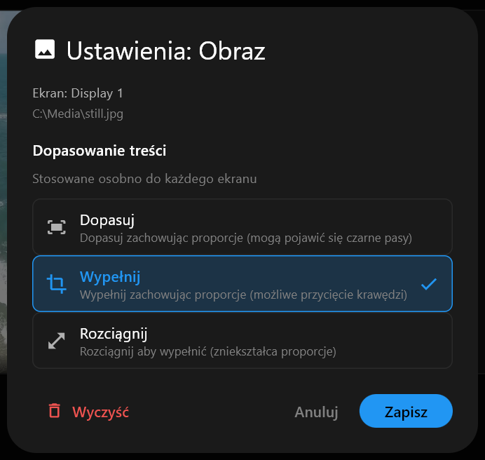 Okno Ustawienia: Obraz dla obrazu statycznego, z opcjami sekcji Dopasowanie treści: Dopasuj, Wypełnij i Rozciągnij, zaznaczoną opcją Wypełnij, oraz przyciskami Wyczyść, Anuluj i Zapisz.