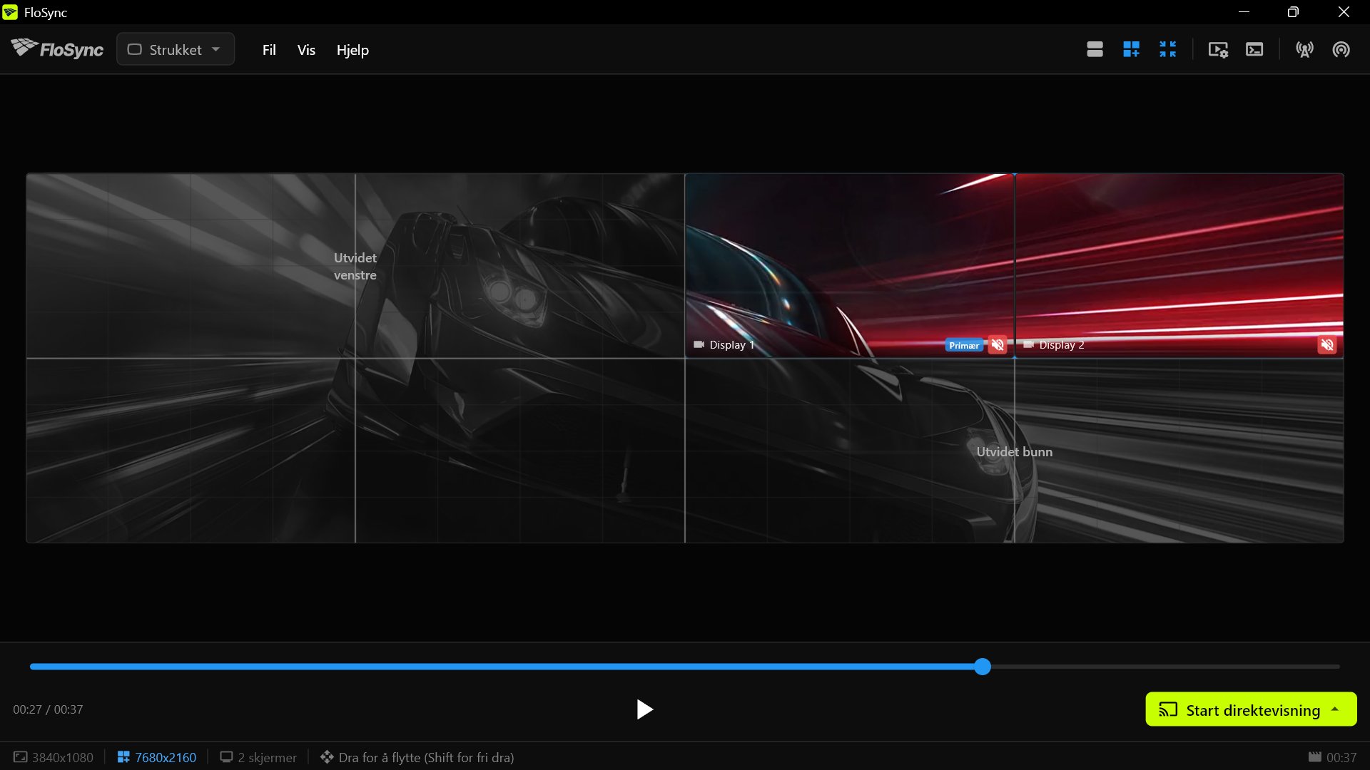 FloSync på PC 2, med innhold på de to lokale skjermene øverst til høyre på veggen og resten av lerretet som et nedtonet virtuelt område.