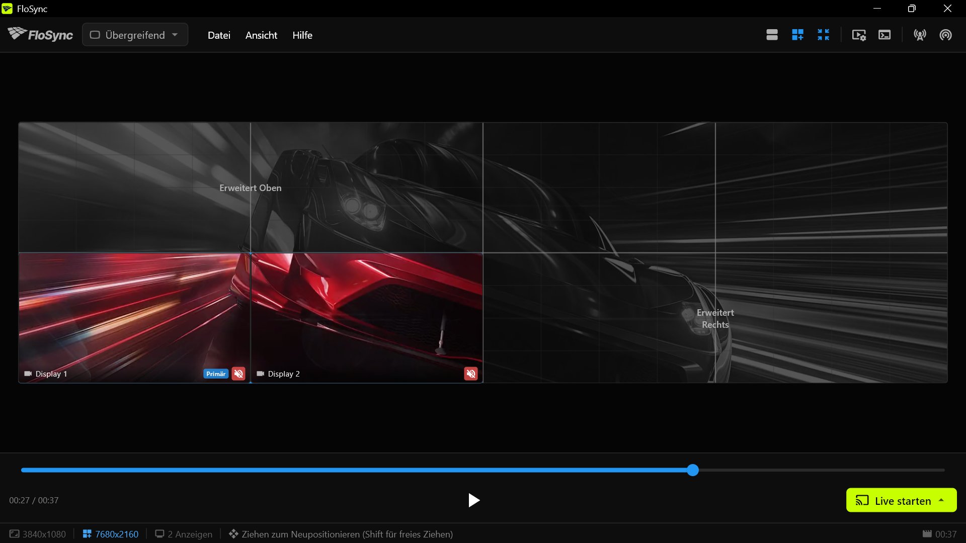 FloSync auf PC 3, das Inhalte auf seinen beiden Bildschirmen unten links in der Wand zeigt und den Rest der Leinwand als virtuellen Raum.