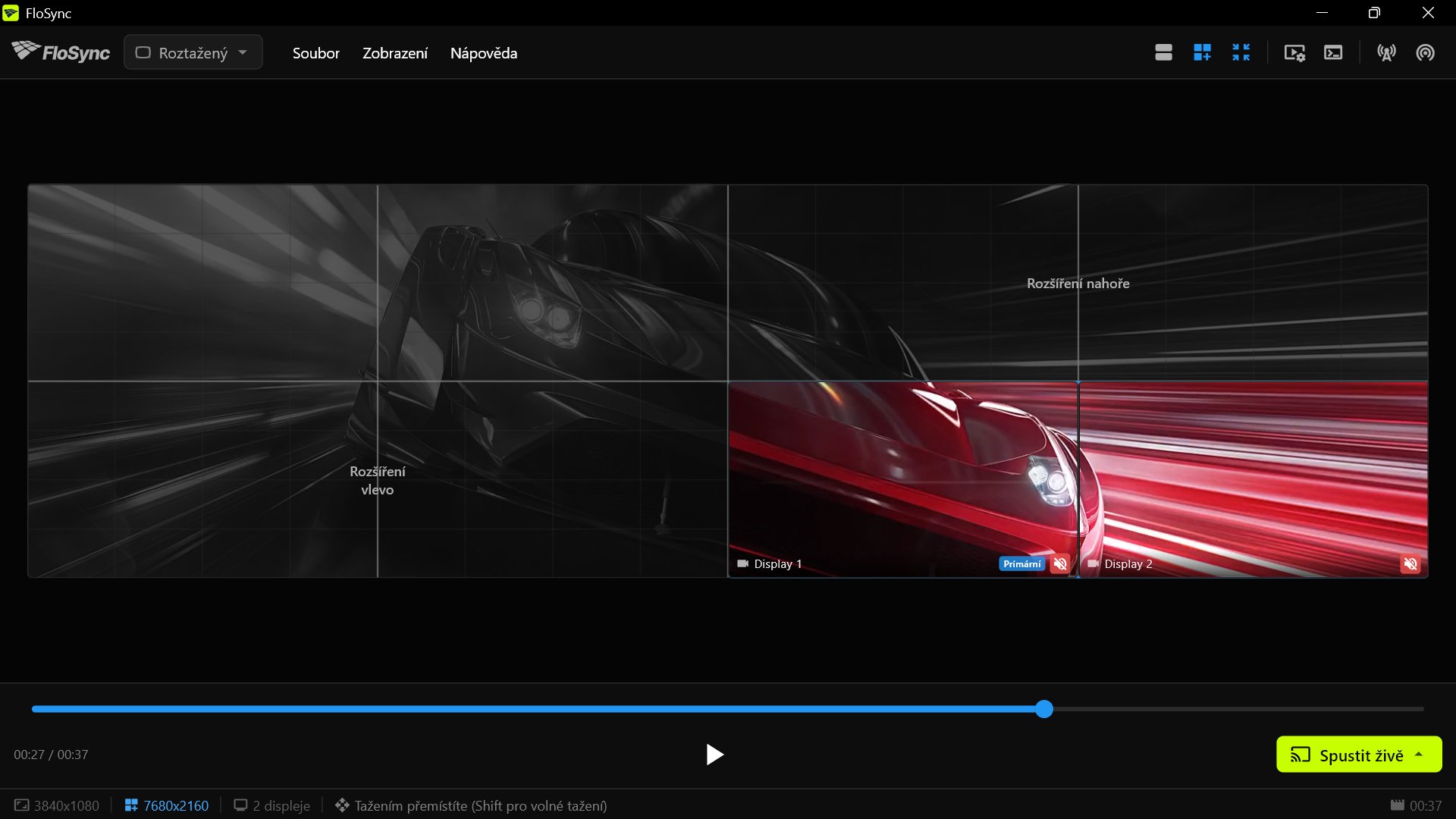 FloSync na PC 4, zobrazující obsah na svých dvou obrazovkách v pravé dolní části stěny a zbytek plátna jako virtuální prostor.