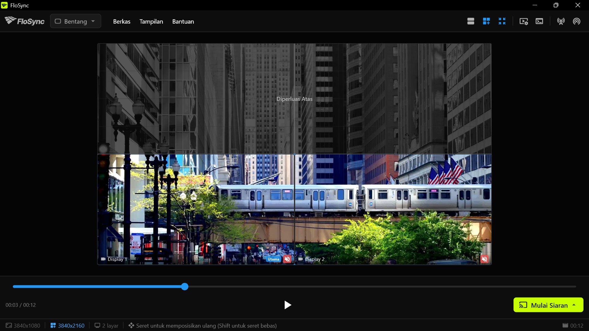 Tampilan kanvas global menunjukkan satu baris virtual di atas kedua layar nyata, dengan frame utuh yang kini pas dengan kanvas yang lebih tinggi