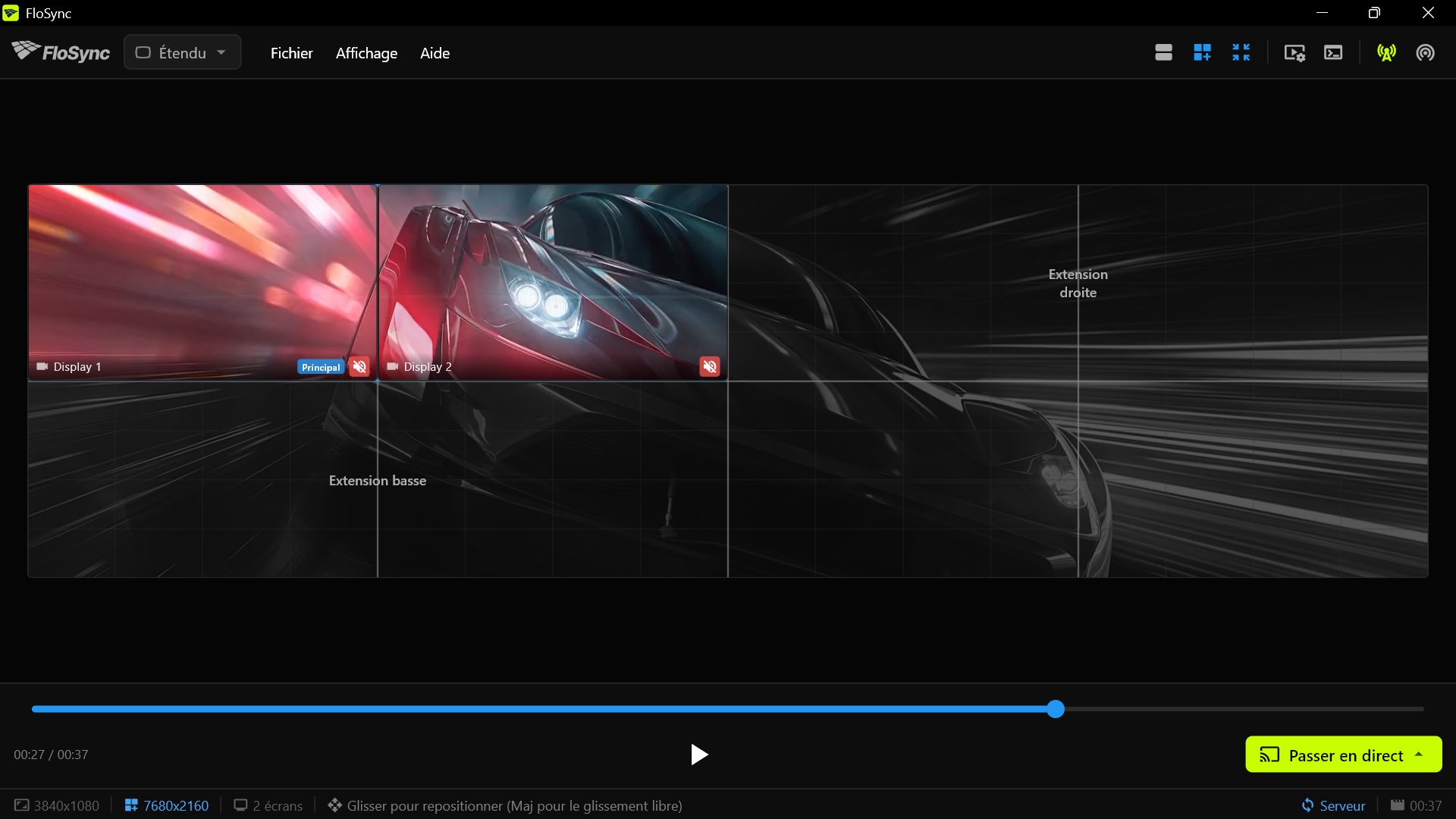 FloSync sur PC 1, le serveur, pendant qu'on maintient sa paire dans l'aperçu du mur entier : ses deux écrans locaux en couleur dans le quart supérieur gauche, le reste du mur en gris, avec les libellés Extension droite et Extension basse.