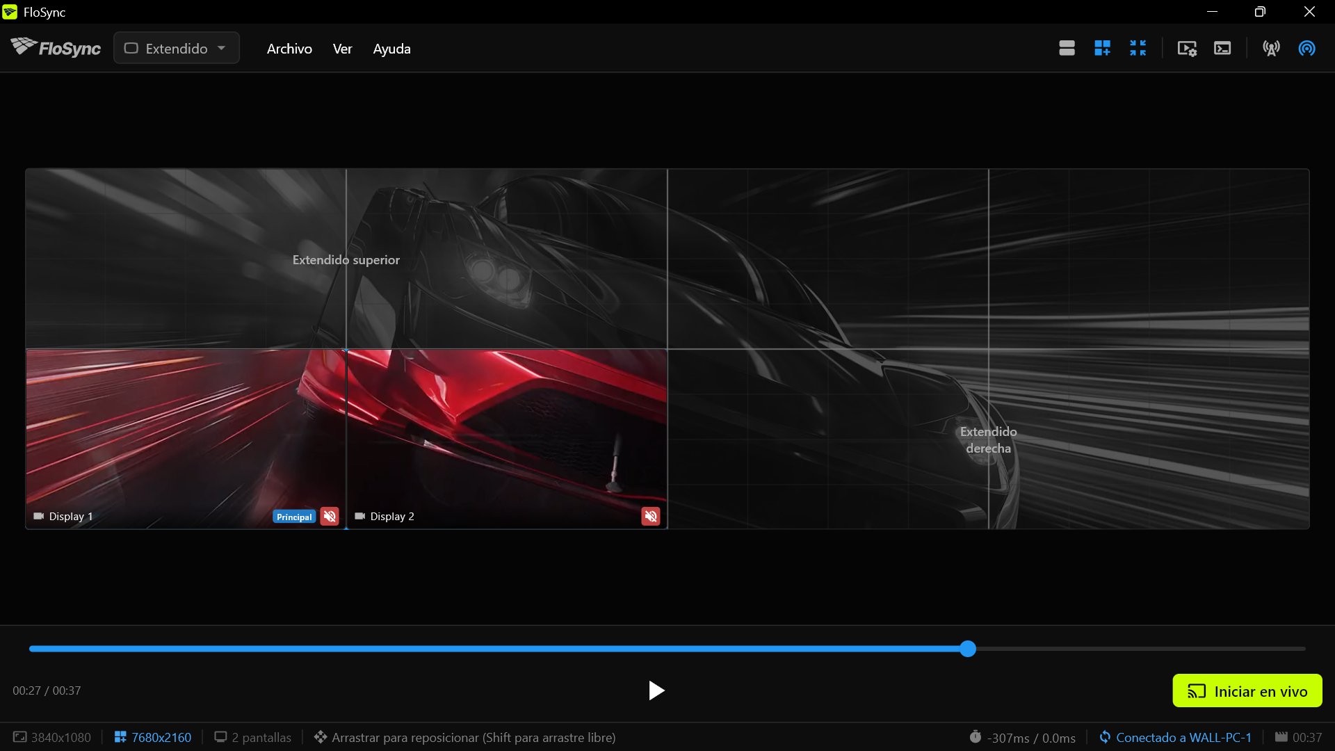 FloSync en el PC 3, conectado a WALL-PC-1, mientras se arrastra su par en la vista de todo el muro: sus dos pantallas locales en color en el cuadrante inferior izquierdo y el resto del muro en gris, con las etiquetas Extendido superior y Extendido derecha.
